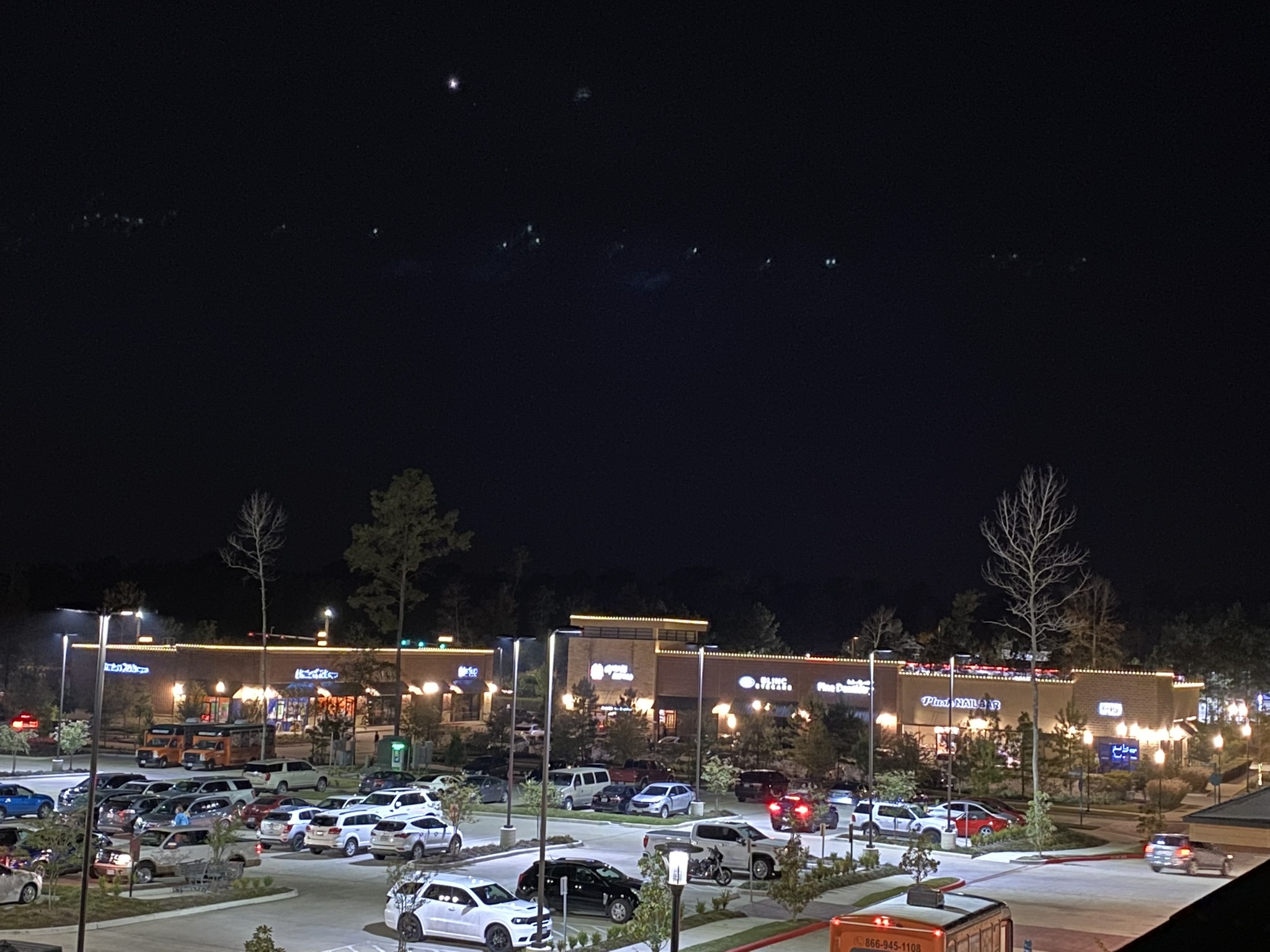 parking lot at night with bright lights